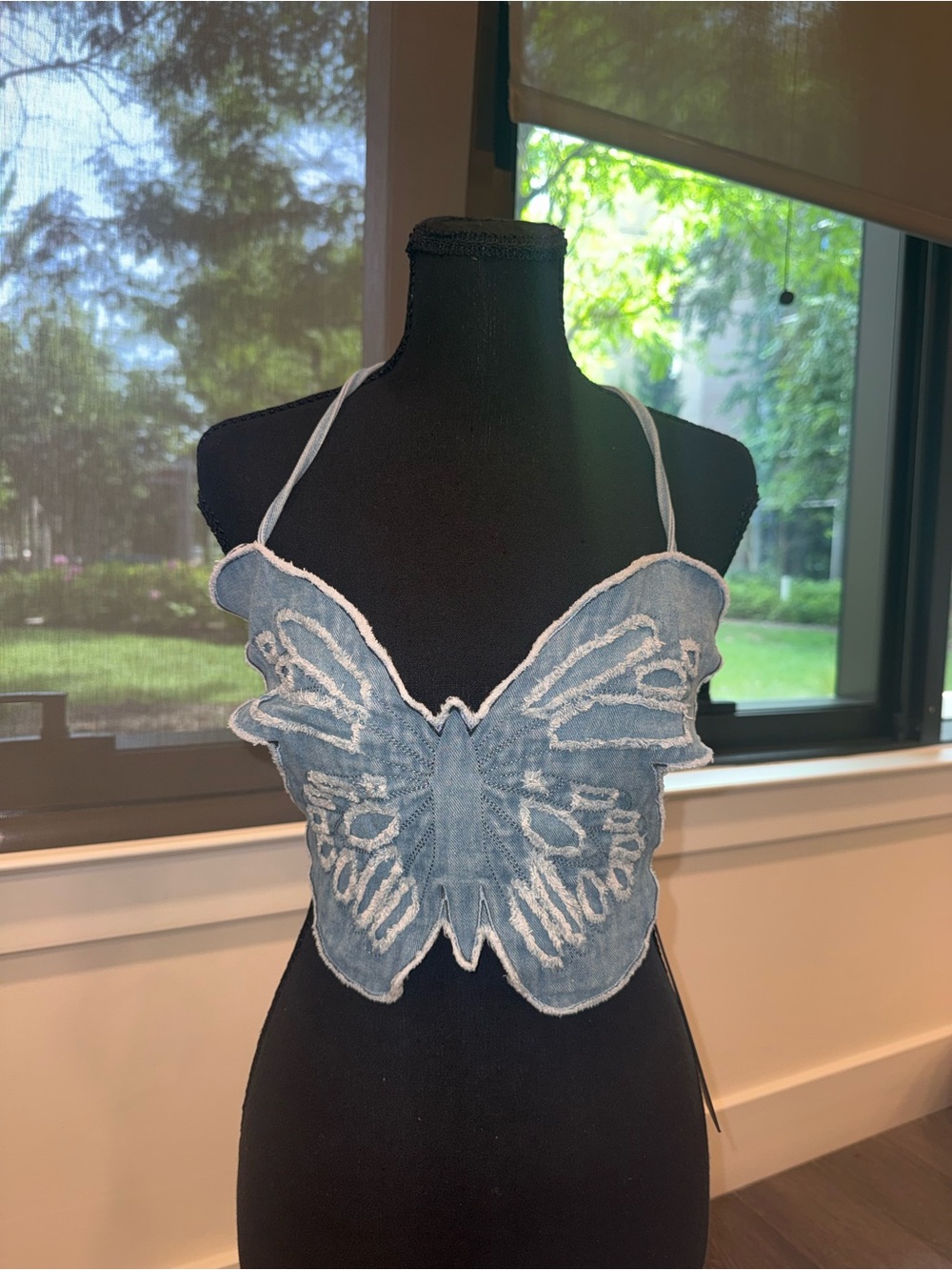 White Fox Boutique Blue Butterfly Denim Halter Crop Top